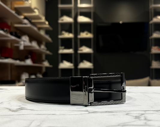 CINTO FERRAGAMO NEGRO / CAFE HEBILLA RECTANGULAR PLATEADO CON SIGNOS INCRUSTADOS